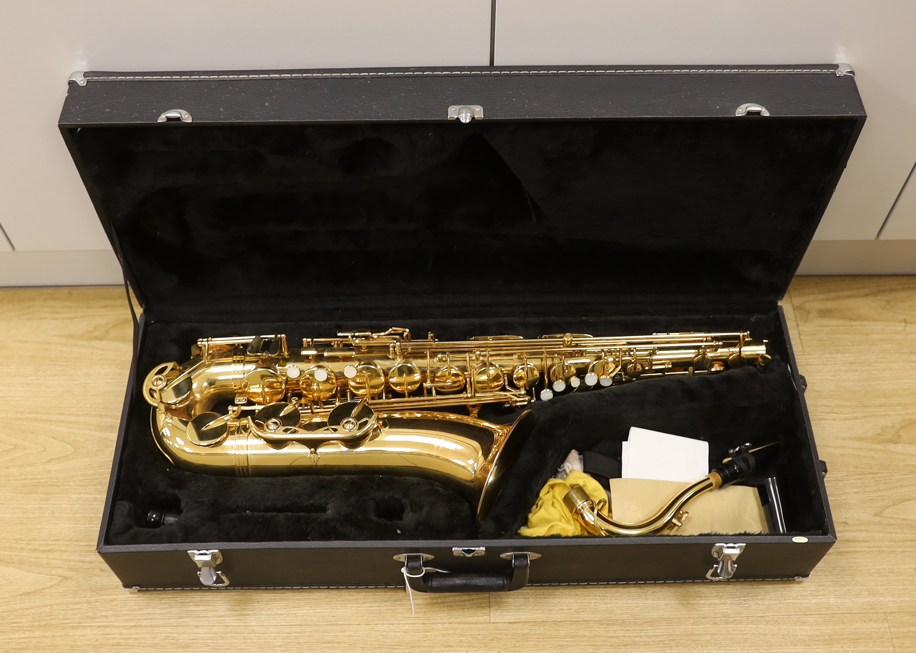 A Jupiter saxophone with fitted case